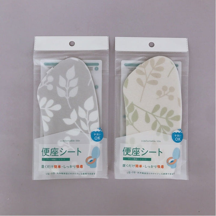 Can Do leaf print washable toilet seat sheet packaging in gray and white