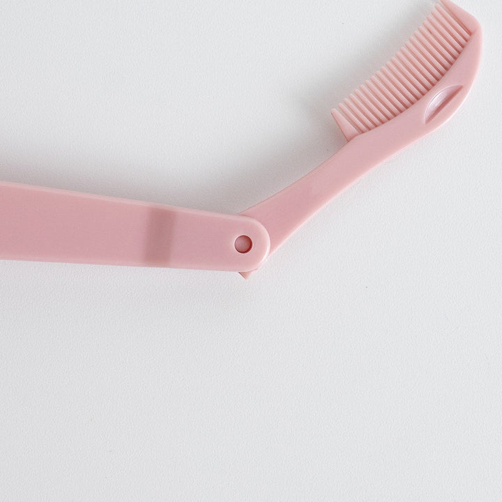 Pink folding eyelash comb detail image
