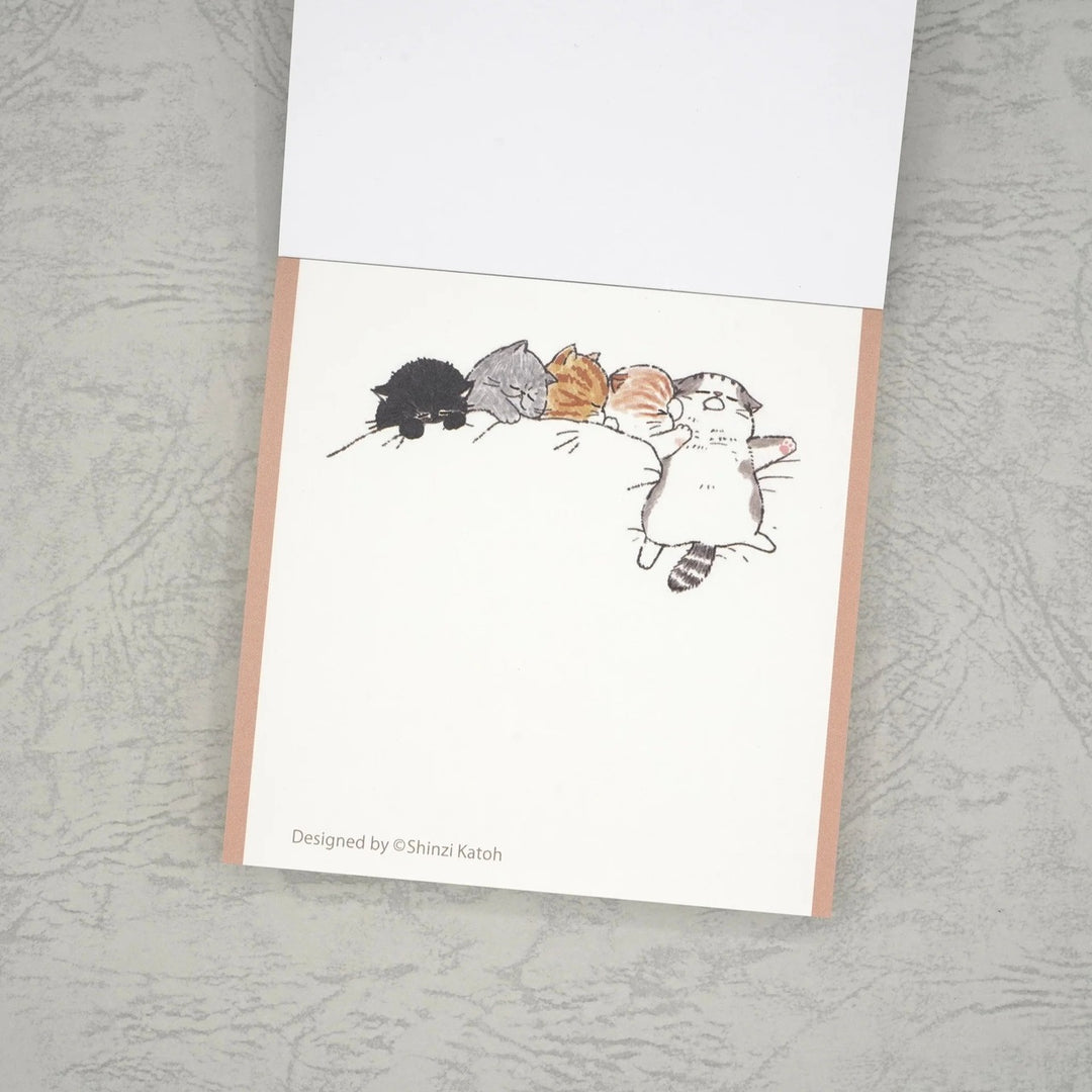Sleeping cats memo sheet design by Shinzi Katoh