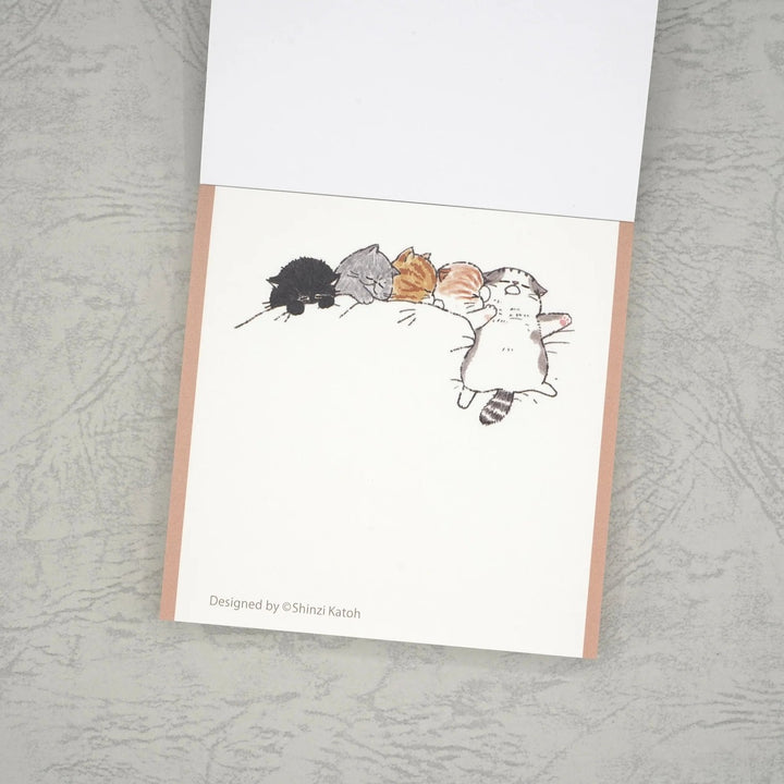Sleeping cats memo sheet design by Shinzi Katoh