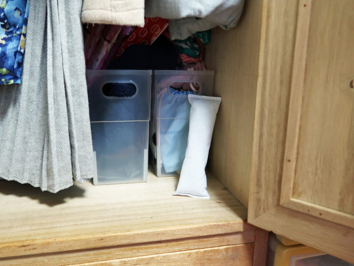 Bamboo charcoal moisture absorber placed in closet storage space