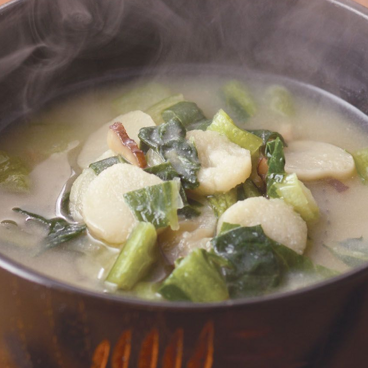 Kayanoya komatsuna and baked wheat gluten miso soup prepared serving with shiitake dashi