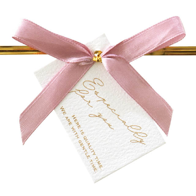 Pink ribbon gift tie detail