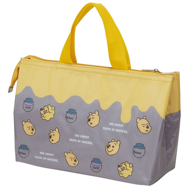 Skater Winnie the Pooh lunch bag back side with honey pot pattern